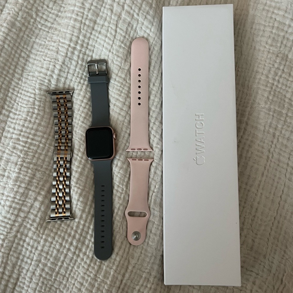 Series 6 Apple Watch Rose Gold, with three bands.